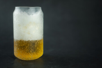 Close up of cold beer on dark background