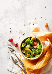 bowl of vegetable mixed salad top view flat lay