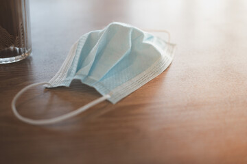 Blue mask protection against coronavirus. Health care and medical concept.