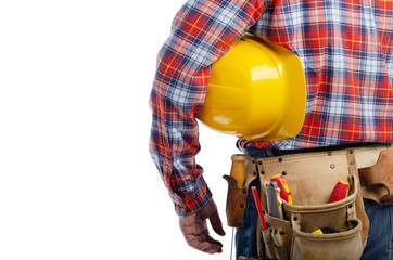 Fototapeta na wymiar Middle aged caucasian contractor with tool belt holds yellow hard hat under his hand on white background