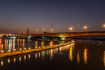 Fototapeta na wymiar Rama VI Bridge Evening along the Chao Phraya River, Bangkok, important photo spots