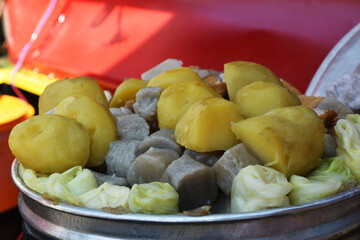 Siomay is an Indonesian steamed fish dumpling with vegetables