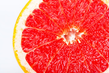 Grapefruit citrus fruit with half on white with clipping path