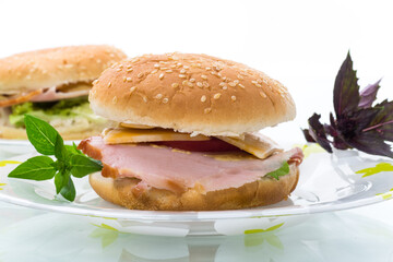 morning sandwich with bacon, cheese and herbs