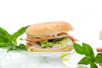 morning sandwich with bacon, cheese and herbs
