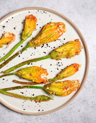 Stuffed zucchini flowers with ricotta and anchovies