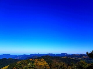 Fototapeta na wymiar Mountain landscape with blue sky.