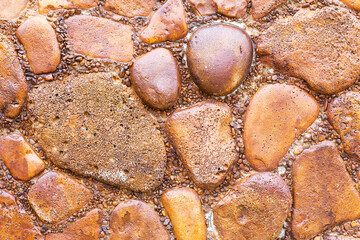 lot of stones close-up on beach, pebbles as textured background