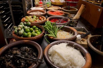 Raw materials used to make papaya salad.