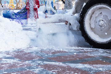 Machine remove snow from a city street