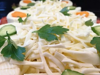 cheese plate served with various cheeses on the table