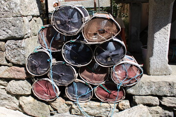 crustacean fishing pots placed in pyramid