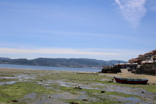 
combarro beach with a boat