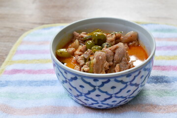 pork curry with eggplant in coconut milk or Panang Thai food on bowl