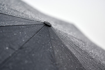 Wet umbrella in rain