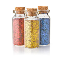 Front view of three colorful glitter bottle