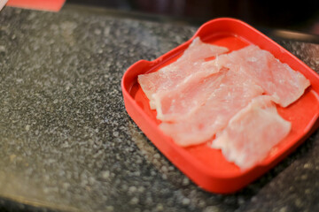Meat sliced in Shabu restaurant