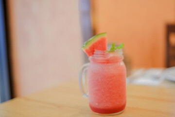 Smoothie water melon with slice water melon selective focus