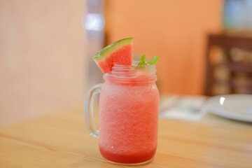 Smoothie water melon with slice water melon selective focus
