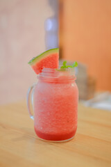 Smoothie water melon with slice water melon selective focus