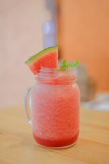 Smoothie water melon with slice water melon selective focus