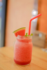 Smoothie water melon with slice water melon selective focus