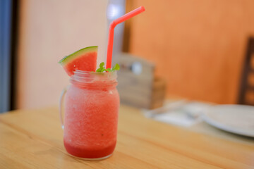 Smoothie water melon with slice water melon selective focus