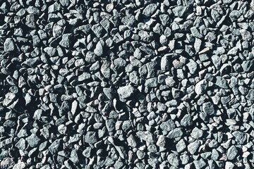 The background is made of gray stones.