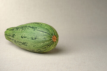 Zucchini on the linen backfround