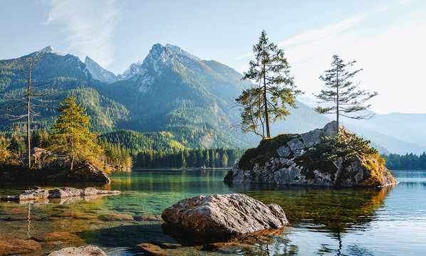 Wonderful Sunny scenery. Splendid mountain landscape. Scenic image of fairy-tale Hintersee lake of summer. Popular travel and hiking destination. Picture of wild area. Awesome Background of nature.