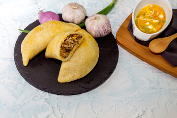 Colombian empanadas with chili sauce