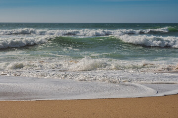 Waves breaking in a beach