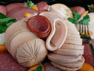 sliced ​​salami varieties on serving plate