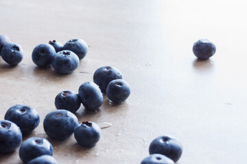 Fresh blueberries with dewdrops. Culinary background. Shallow depth of field (DOF)