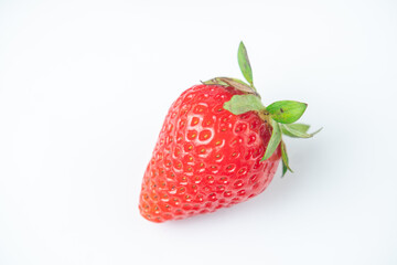 One strawberry berry on a white background