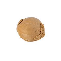 A ball of creamy fruit ice cream brown on a white background