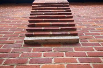 Architectural feature of stepped brickwork newly laid with mortar in between