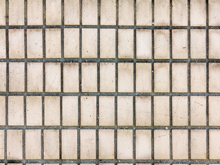 Old outdoor facing tiles for buildings. Abstract geometric architectural background.