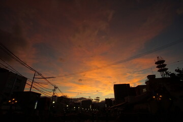 sunset scene of small town with street lights in Japan, Matsumoto