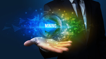 Elegant hand holding MINING inscription, digital technology concept
