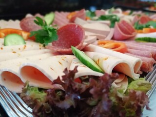 sliced ​​salami varieties on serving plate