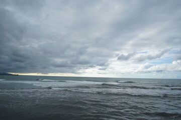 blue sea and cloudy sky over it. Blue Sea sky and Clouds