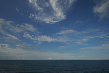 Obraz premium perfect blue sky with clouds and water of the sea