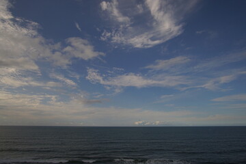 perfect blue sky with clouds and water of the sea