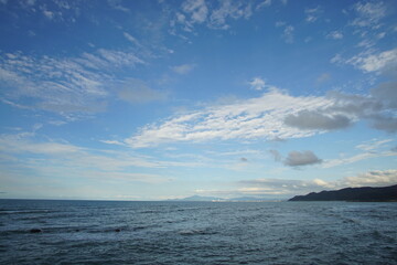 perfect blue sky with clouds and water of the sea