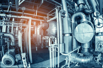 Industry plant concept,Equipment, cables and piping as found inside of a modern industrial power plant or offshore platform