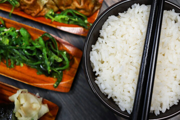 Japanese food of gyoza, seaweed spices and sushi 