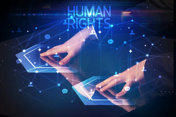 Navigating social networking with HUMAN RIGHTS inscription, new media concept