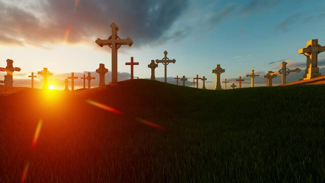 Stone crosses in cemetery in sunset time