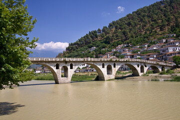 Fototapeta na wymiar View of Osum River and Gorica Bridge in Berat City. Albania. Europe.